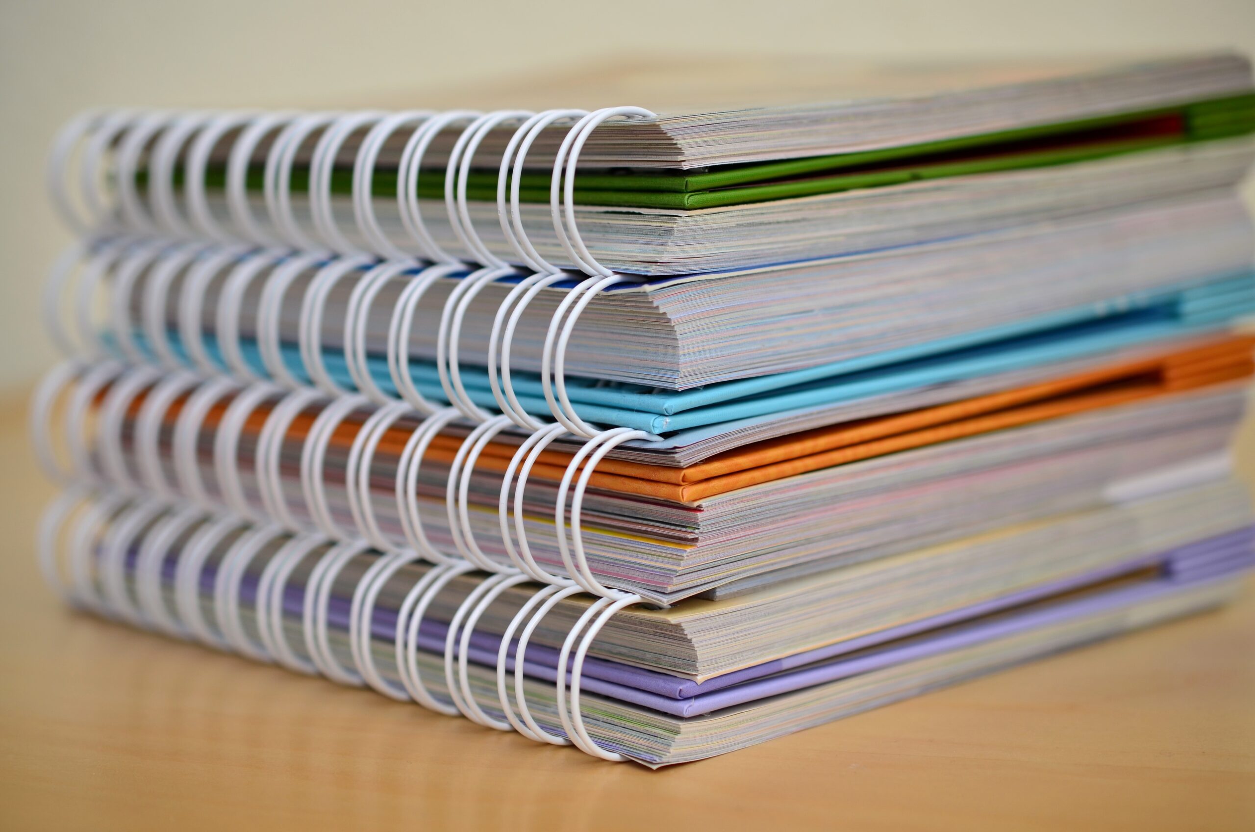 A stack of binders representing an estate plan.